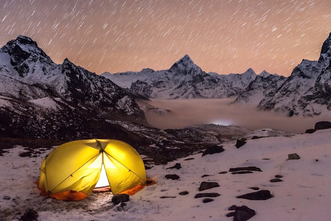 Best Military Sleeping Bags (2026) 5 Sleeping pad inside tent with winter conditions visible outside